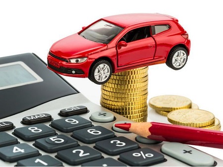 Image That Represents The GST on Cars Concept - Featuring With A Car Kit with calculator, coins and pencil.