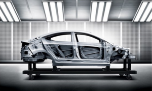 Image Showing A Steel Car In The Manufacturing Stage Placed In An Automotive Enterprise