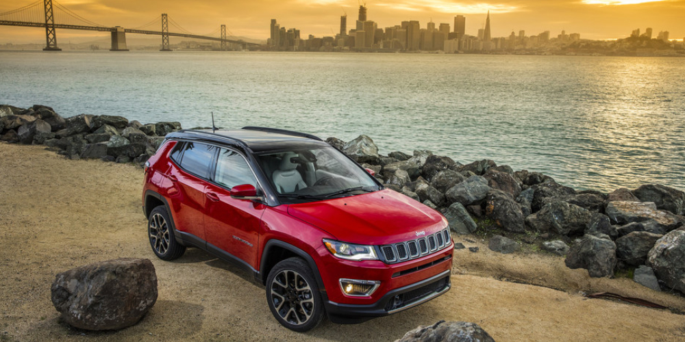 Jeep Wrangler For Driving On Off Road Terrain On The Seashore In A Beautiful Sunset